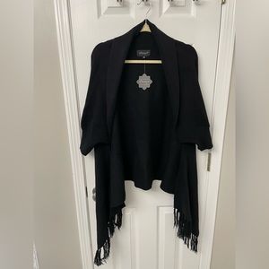 Sweater shrug with tassels